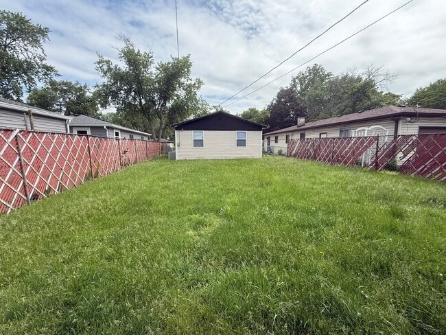 Photo - Newly rehab, three bedroom, one bath and Christian Park with a fence yard.