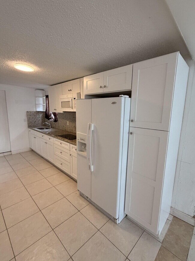 Photo - "Charming 1-Bedroom Retreat in Tampa - Cozy 650 Sq. Ft. Home Awaits!"