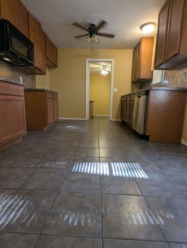 Photo - Quaint 3/2 on large shaded lot in Azle! Su...