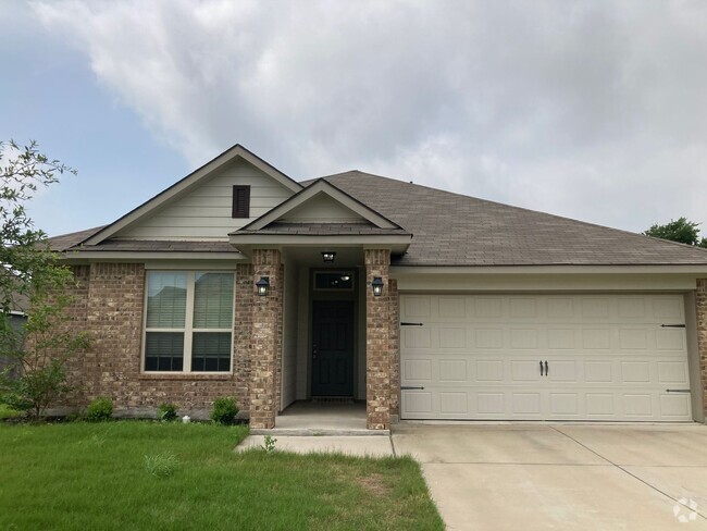 Building Photo - Three-bedroom, Two bath, two car garage Ho... Rental