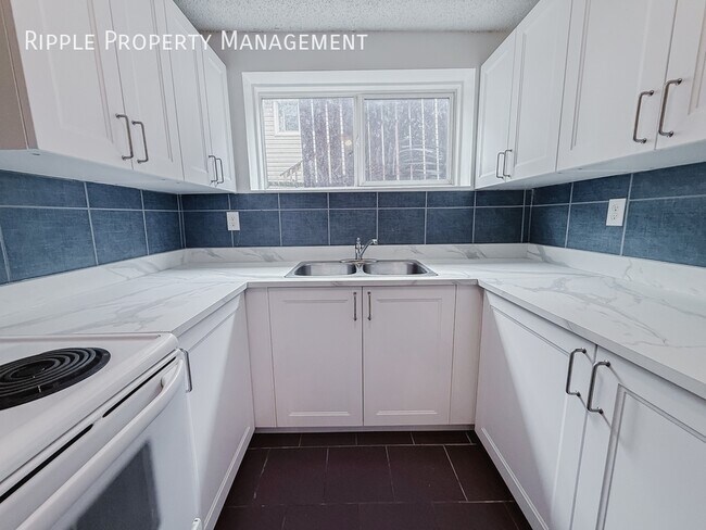 Photo - 1513-1536 36 St SE