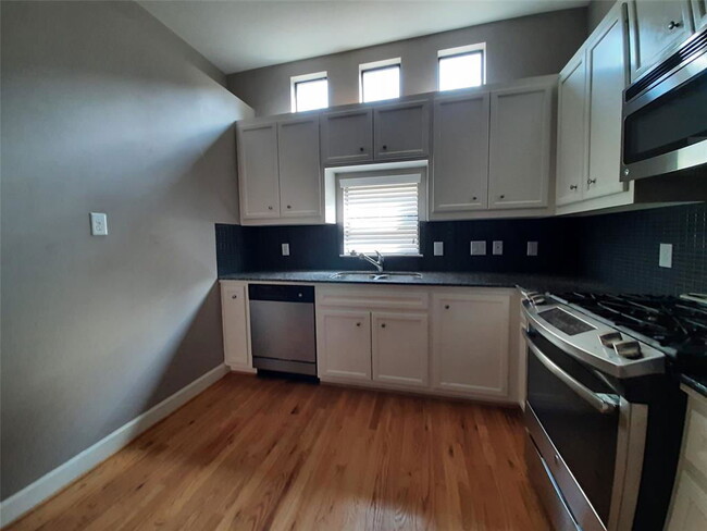 Photo - 11315 Main St Townhome