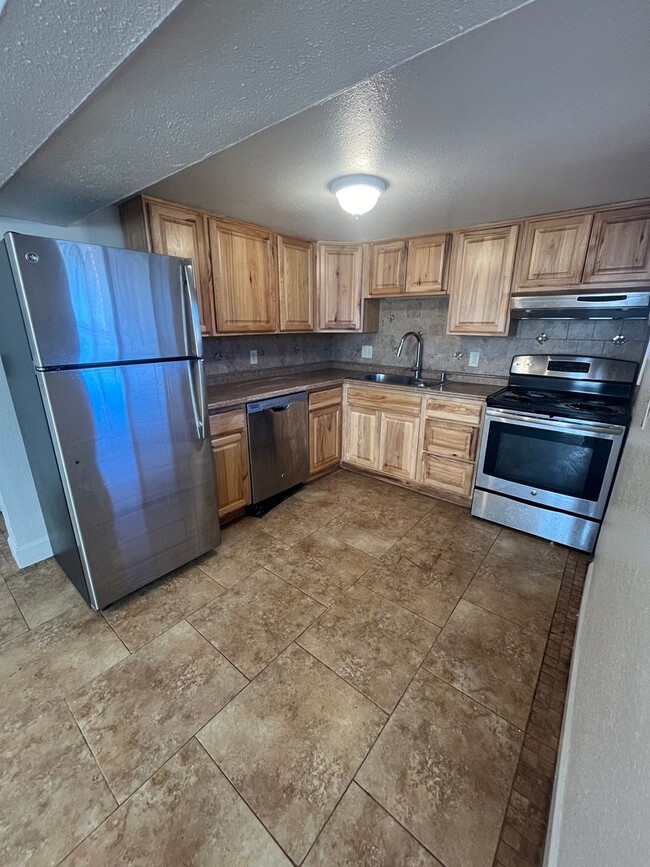 Photo - 7120 W 16th Pl Apartamento Unidad #B