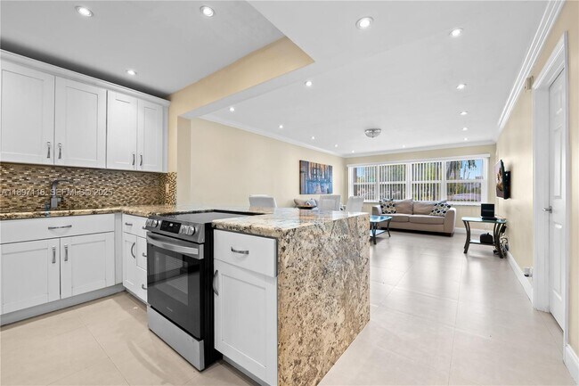 Building Photo - 329 SE 3rd St Unit 103S