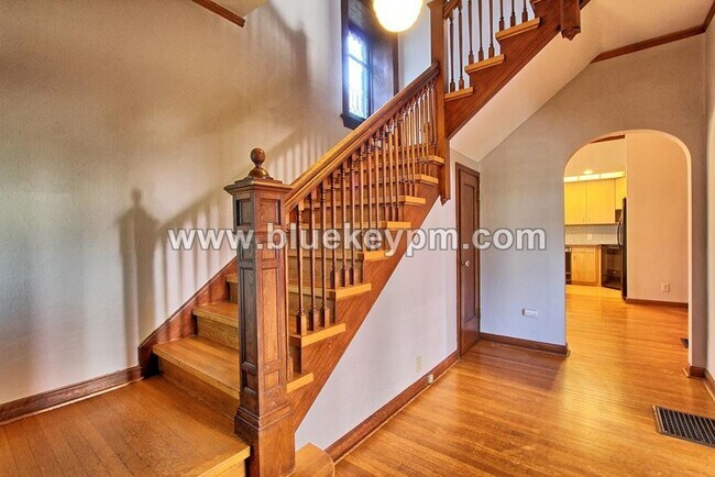 Photo - First Month Fee on a 12 Month Lease!  2 Bed, 1 Bath 2 Story Unit with Victorian Architectural Detail