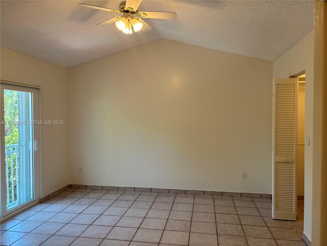 Building Photo - 10520 SW 153rd Ct Unit 1
