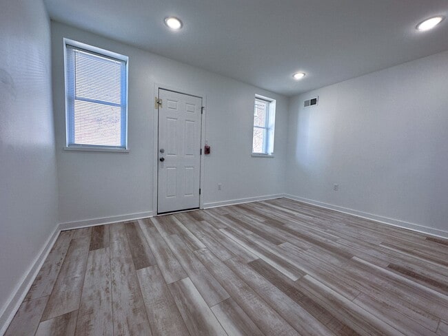 Photo - Renovated 2BR/2BA w/ Private Yard, Porch & In-Unit Laundry Unit 1F