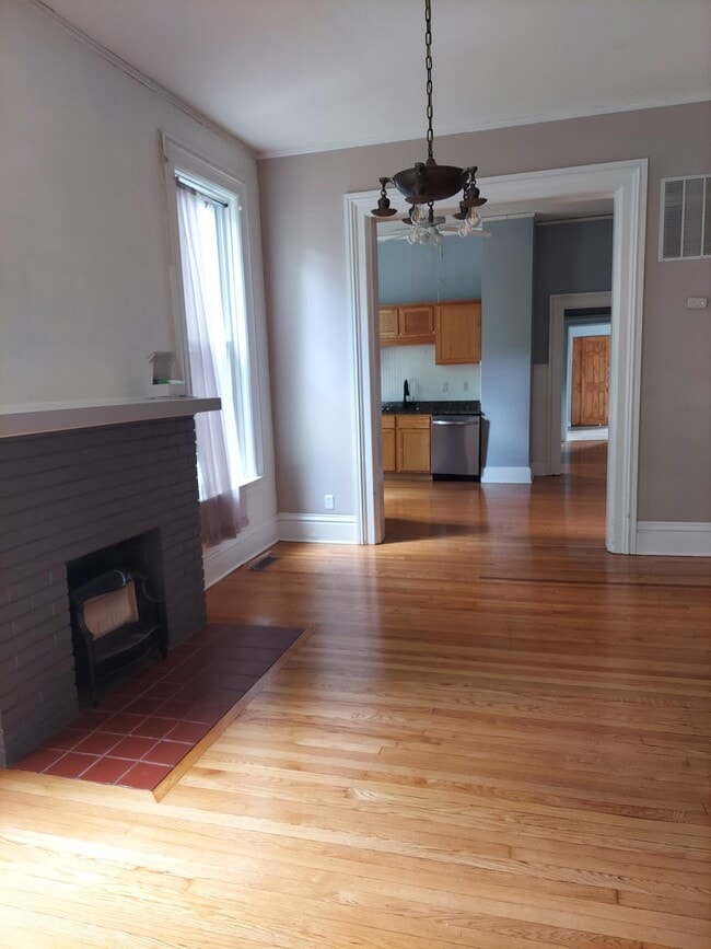 Living room Fireplace - 705 W Healey St Unit 705 Healey