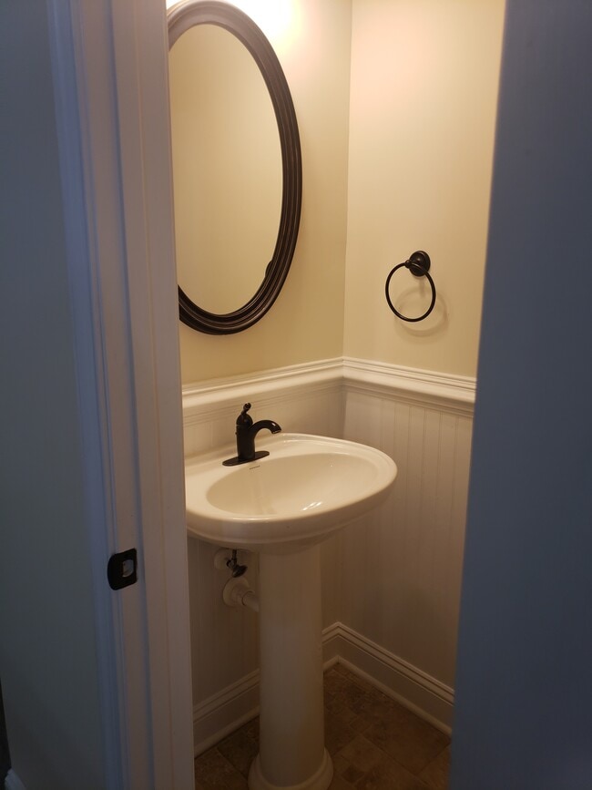 Half Bath by Front Door - 216 Astra Ln