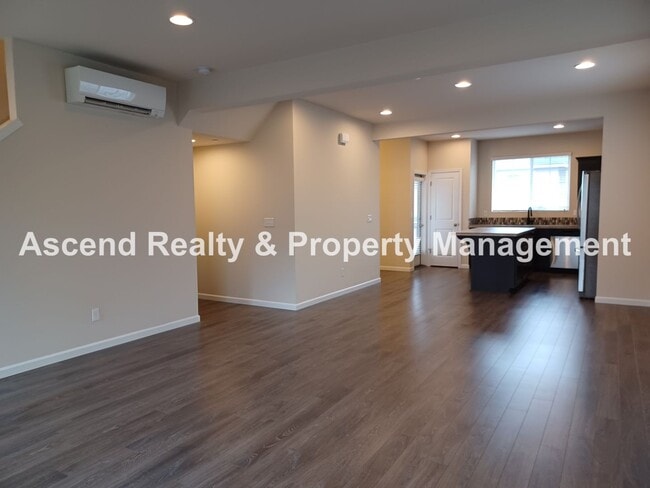 Photo - 3 Level End Unit Townhome with Newer Carpet, Open Floor Plan, 2 Balconies, 2 Car Attached Garage ...