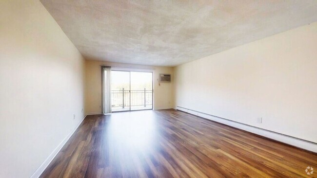 Building Photo - 2-Bed * 2-Bath w/ h & hw + one free month ... Rental