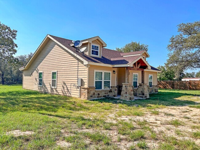 Photo - Elegant Stone-Front Home on 1 Acre in Natalia