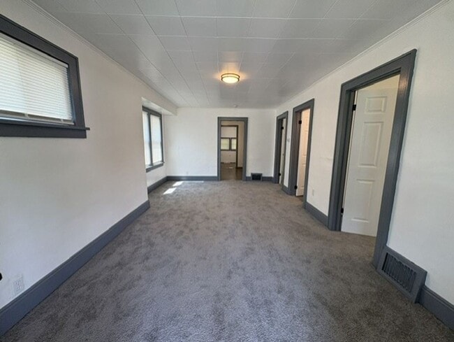 Photo - Move-In Ready 2-Bedroom Home with Modern Kitchen, Basement & Front Porch