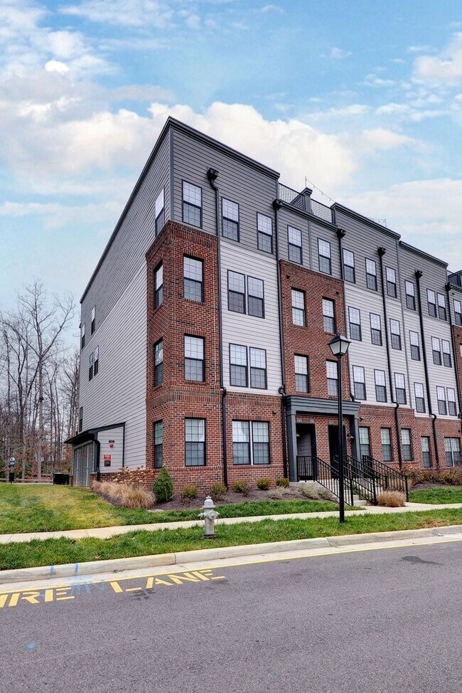 Photo - Three Story Brick End Unit with Rooftop Terrace