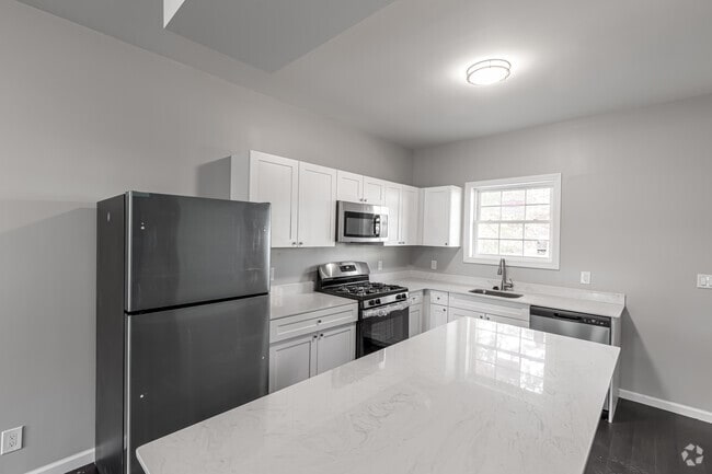 2BR, 2.5BA - Kitchen - Apex Townhomes