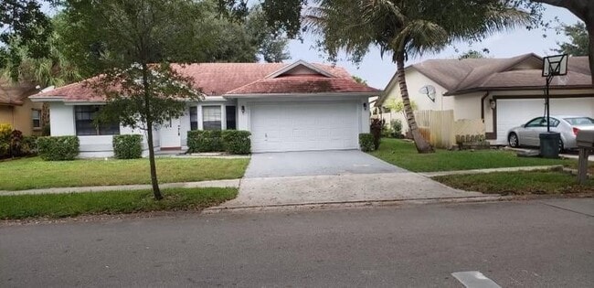 Building Photo - 9555 NW 25th Ct