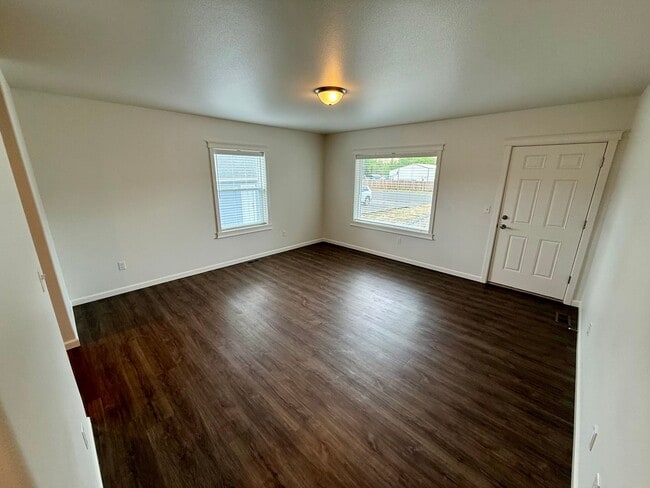 Photo - Spacious 4-Bedroom Home with Detached Garage & Large Yard in Clarkston