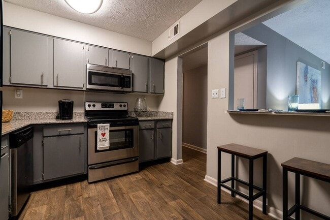 Modern Kitchen w/ Bar Space - Ashton Brook Apartments