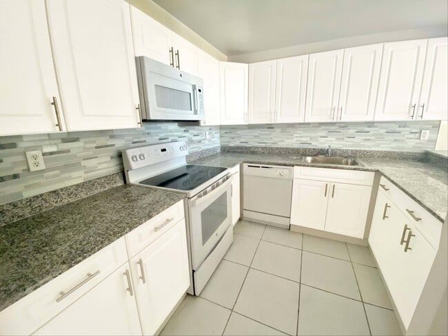 Kitchen with Granite Counter tops
