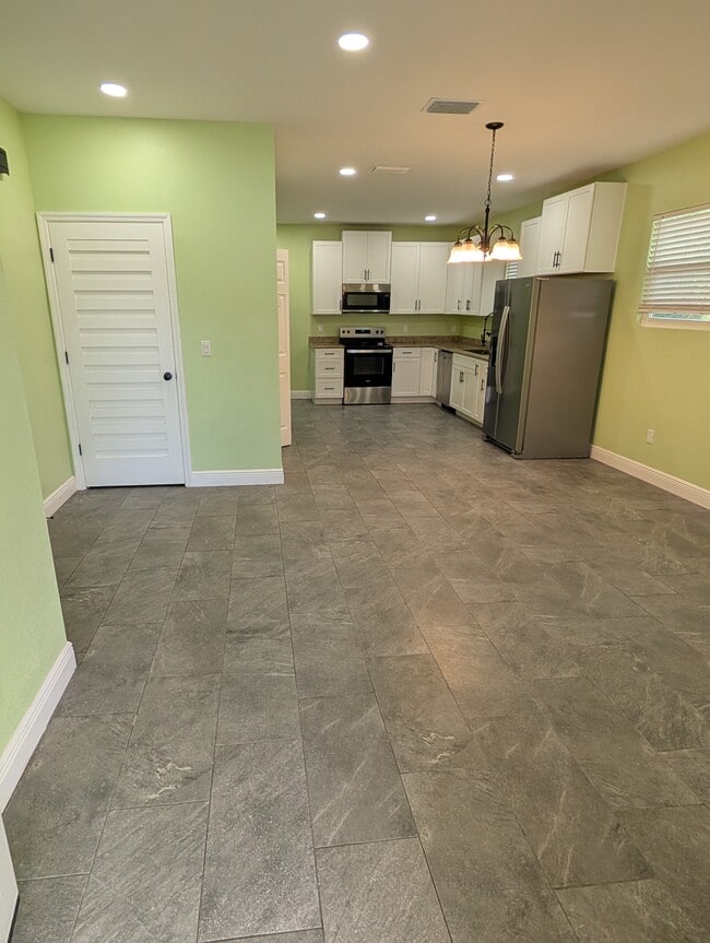 1311 E River Cove St