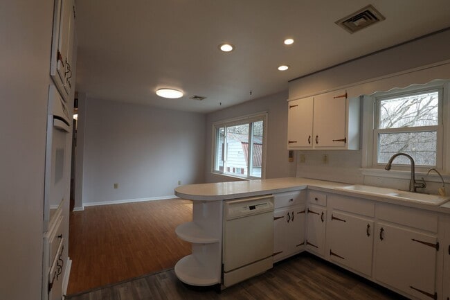 Photo - Charming 2-Bedroom Home with Spacious Yard & Sunroom – $1,600/Month