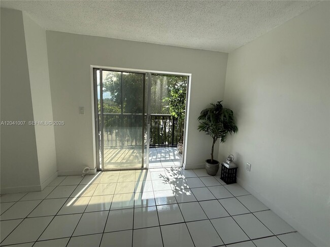 Building Photo - 13455 NE 10th Ave Unit 410