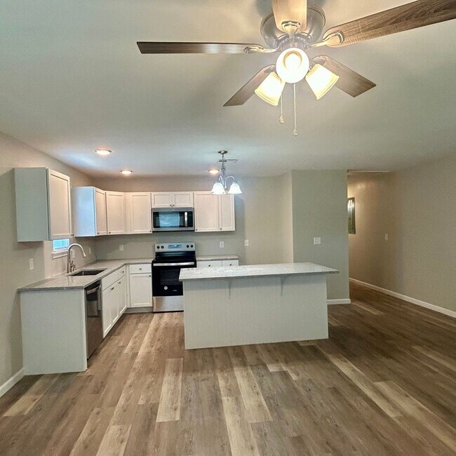 Photo - Welcome home to this beautifully designed 3-bedroom, 2 bath half duplex