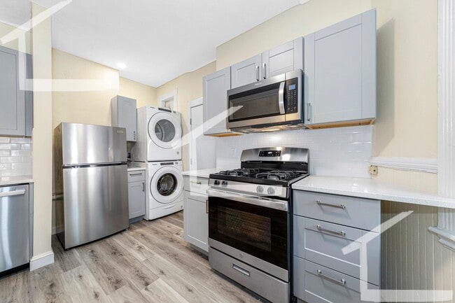 Photo - 9/1 Fully renovated 3BR in Oak Sq, w/d in unit!