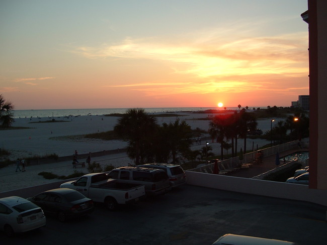 Sunset from patio - 11000 Gulf Blvd Condo Unit #304