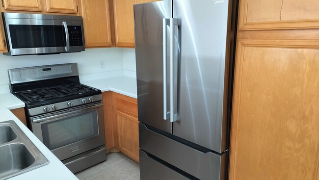 Photo - Townhome with Loft + Two Bedrooms/Baths - Designed for Comfort in Gated Community