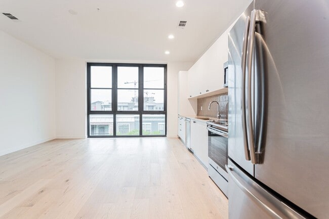 Photo - Light-Filled 2 Bed / 1 Bath – Wide-Plank Hardwood & W/D Included