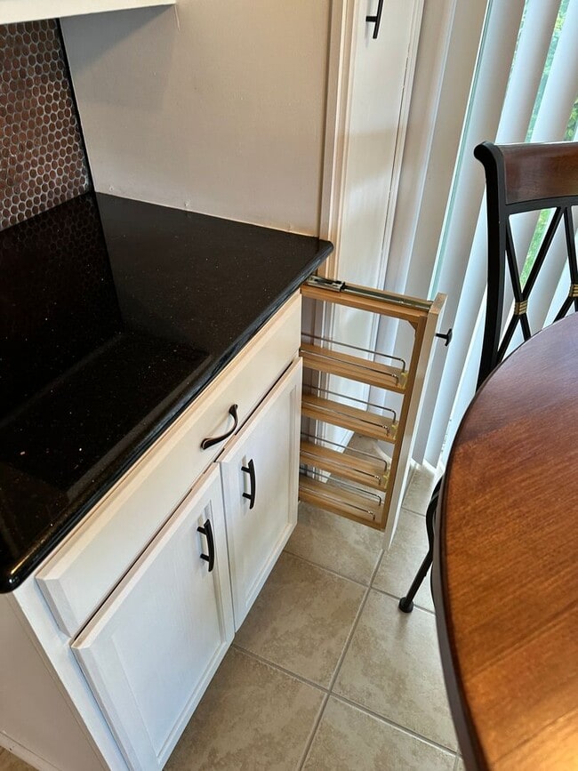 Photo - 3 Bedroom 2 Bath Townhome with Gas Fireplace, community pool, lots of storage