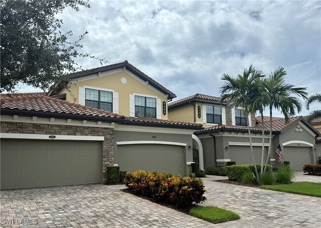 Building Photo - 9498 Napoli Ln Unit 201 Rental