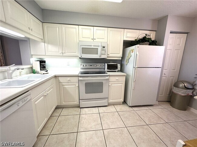 Photo - 6670 Huntington Lakes Cir Unit 103