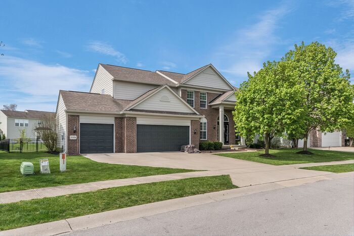 Stunning 6 Bed 3.5 Bath Carmel Home With Finished Basement an Fenced Yard!