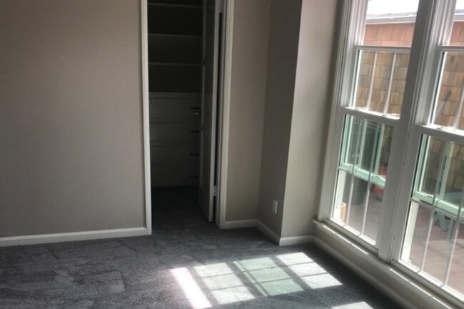 back bedroom with french windows overlooking