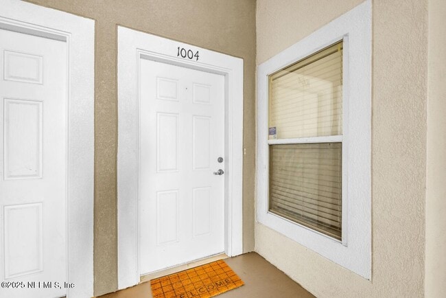 Building Photo - 7920 Merrill Rd Unit 1004