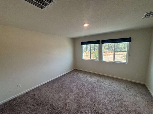 Photo - Updated 4-Bedroom Home Near Antelope Greens Golf Course – Large Backyard & Pet Friendly!