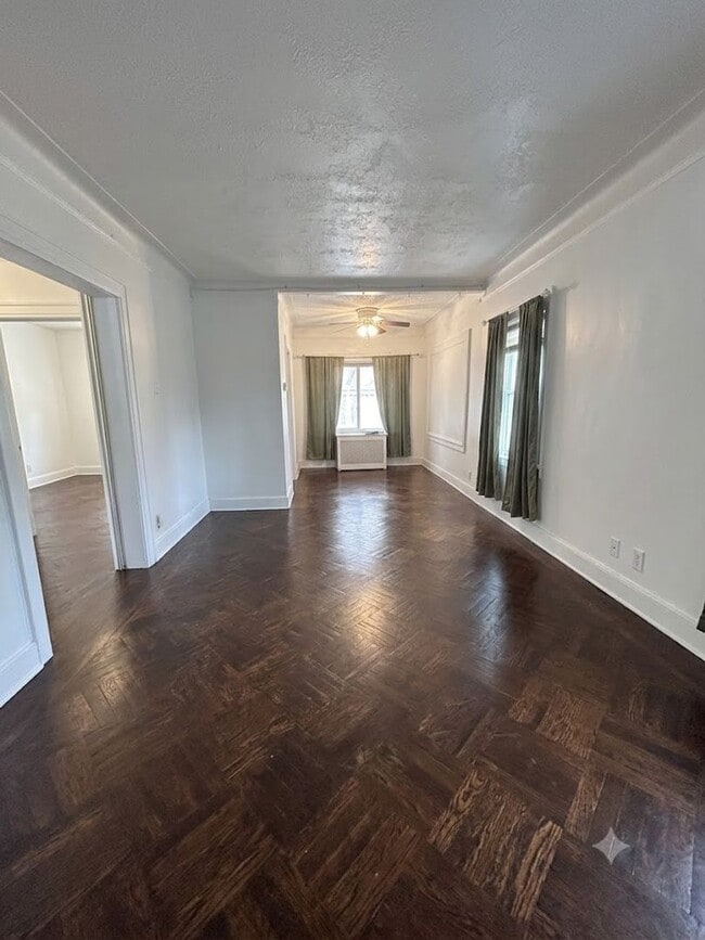 Photo - 4-Bedroom, 1-Bathroom Residence w/ Washer and Dryer