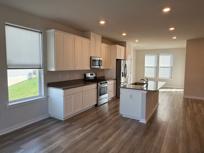 Photo - THREE BEDROOM/ END OF ROW TOWNHOME in Sout...