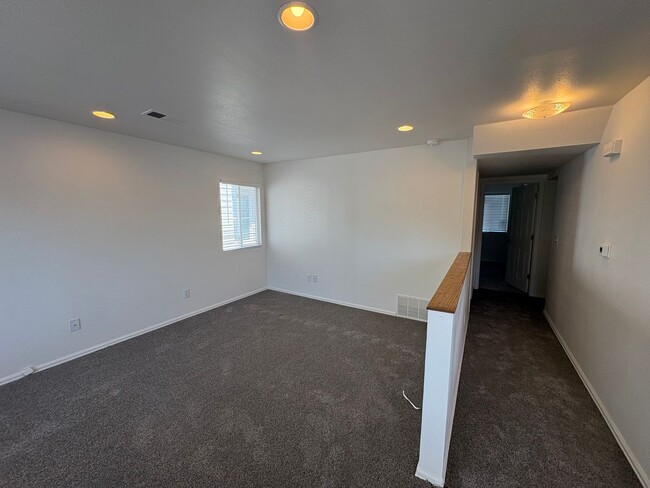 Photo - Fully Renovated 3 Bed 2.5 Bath Townhome w/ 1 Car Garage & Yard!