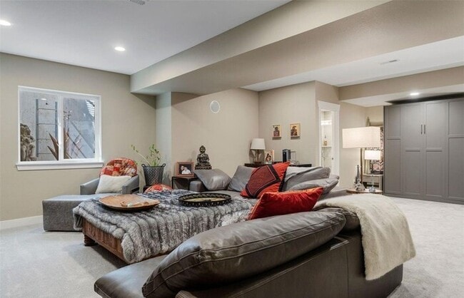 Photo - Modern 3BR Home with Finished Basement & Private Courtyard in Lowry