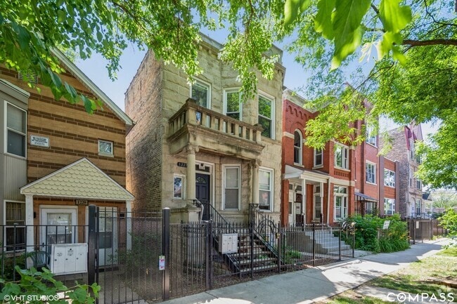 Exterior of building. - 1227 N Rockwell St Unit 2 Rental