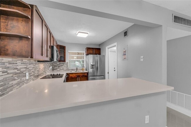 Photo - 9431 Live Oak Pl Unit 205