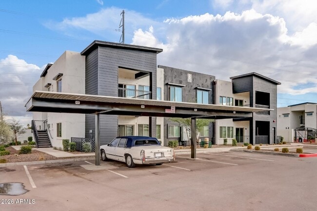 Building Photo - 9160 N 67th Ave Unit 212