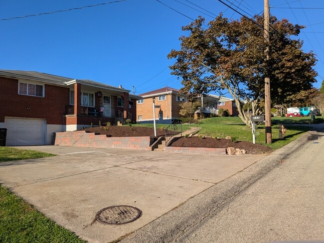 Retaining wall to front porch - 113 High St