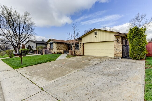 Photo - Great 4 Bedroom 3 Bath Home with 2 Car Garage and Covered Patio!