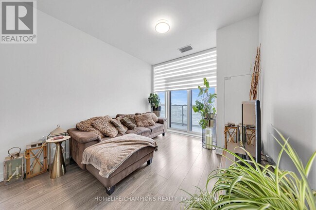 Photo - 225 Village Green Square Unit PH08