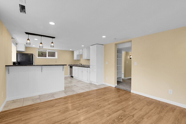 Photo - $1,795.95 - 2 Bed, 1 Bath Duplex Unit in Littleton with Fenced in yard, and In Unit Laundry! Unit 5454 S Elmwood St