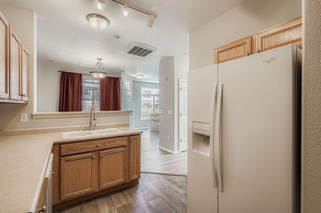 Photo - Move in Ready- Ground floor condo in covered Lodge at Terralago. Swimming Pool- Hot Tub and Fitne...